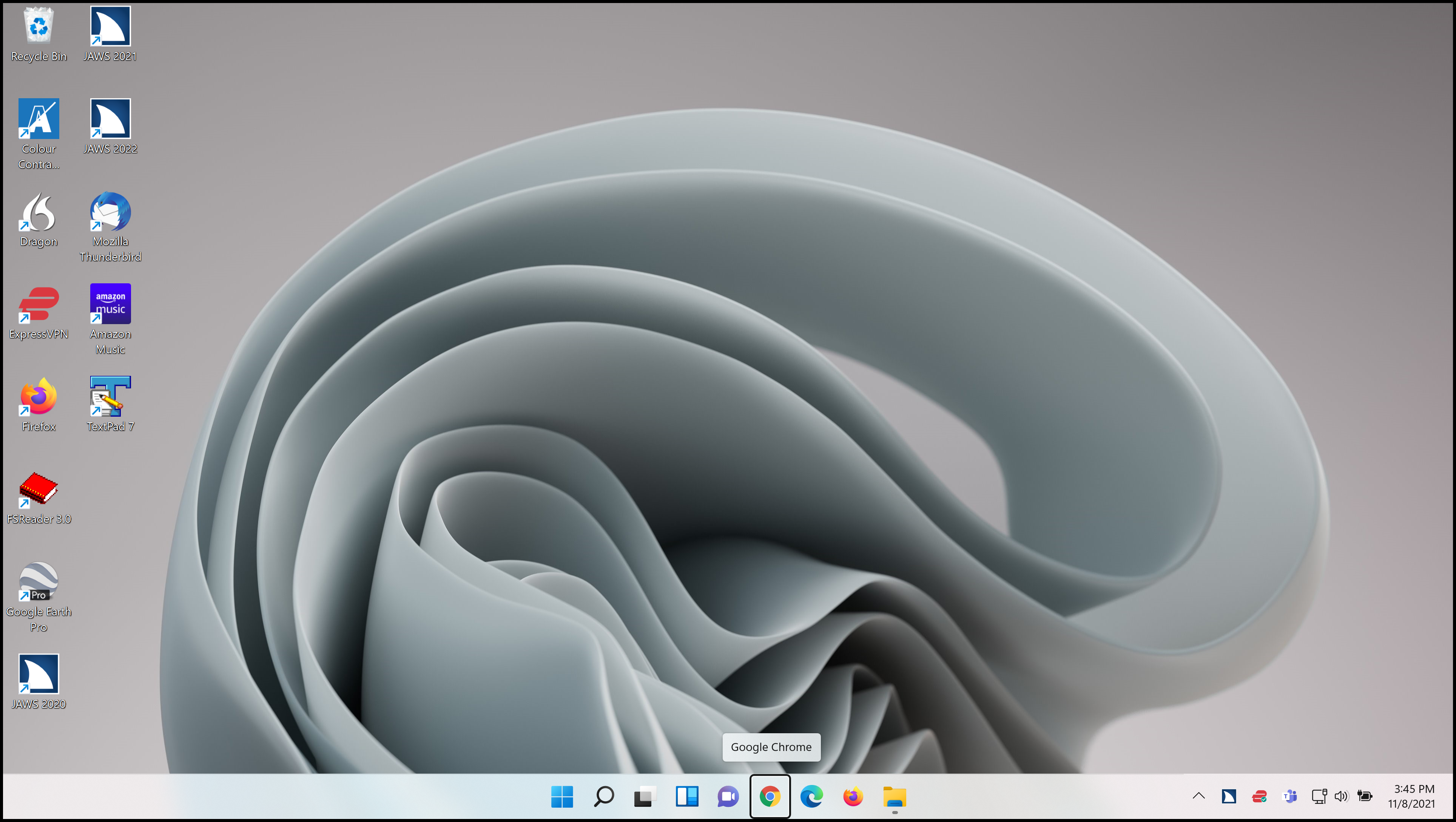 The Windows 11 desktop with focus on the Taskbar